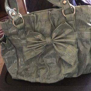 Cute blue/green purse with bow on front